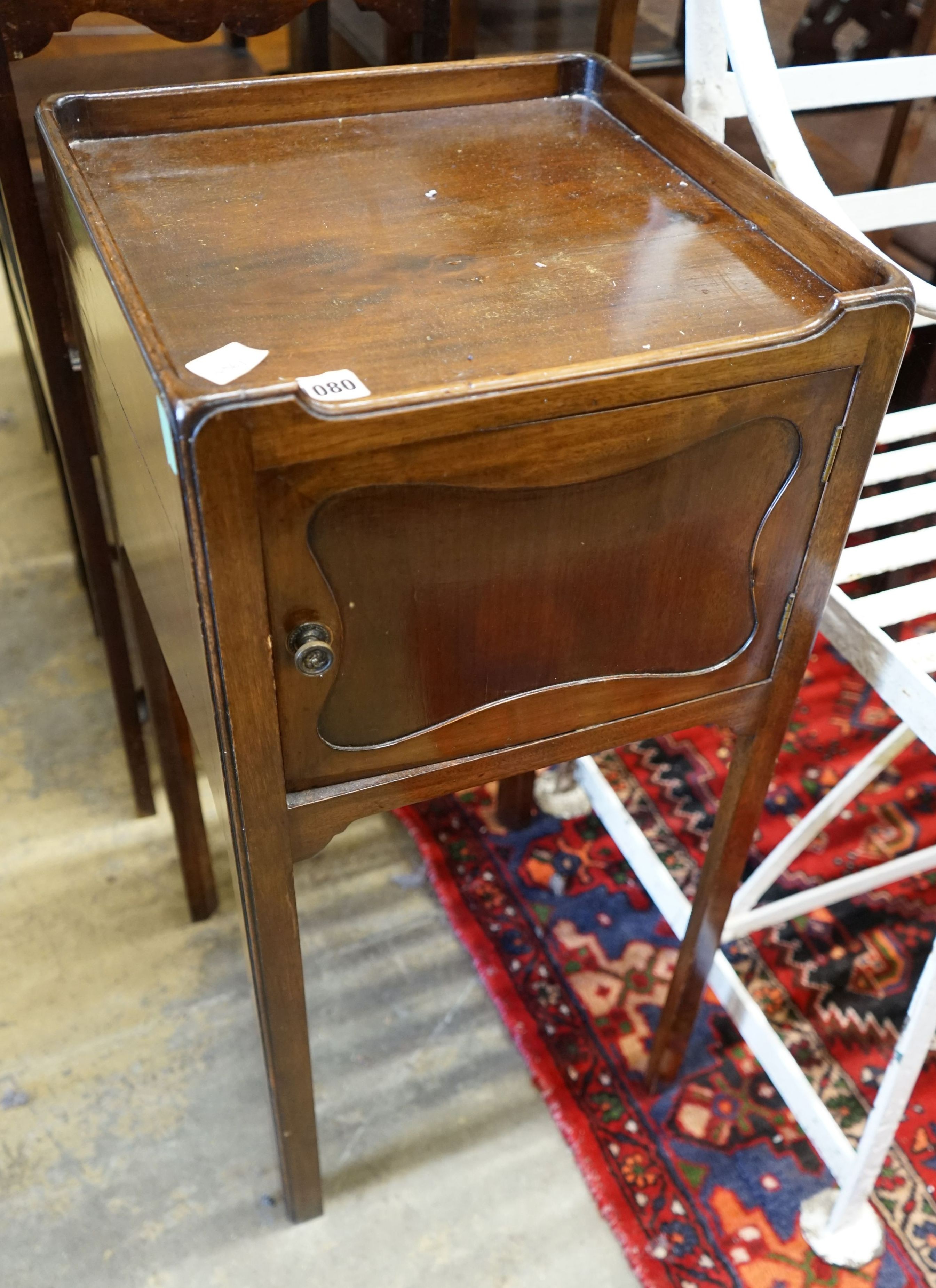 A George III mahogany bedside cabinet, width 35cm, height 75cm.